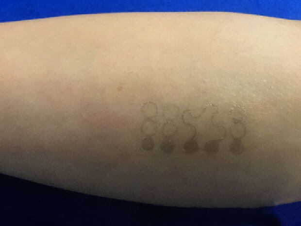 Whoa, this new tattoo ink changes colors depending on your internal health